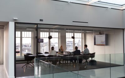 A group of people sitting around a table.